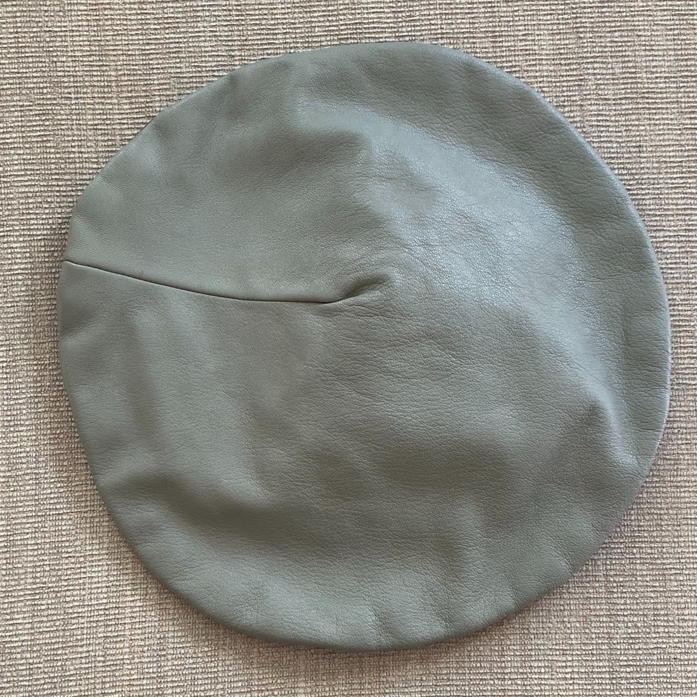 Leather and felt beret